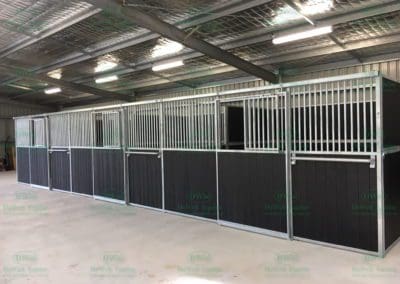 Professional Dressage Stable Panels next to riding arena