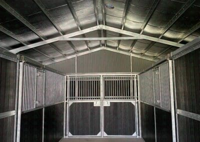 Horse stables with swinging doors