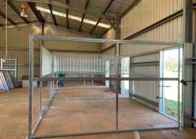 Process of horse stable building in existing shed