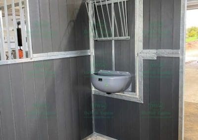 Privacy corner & rotating hay/ Grain rack in horse stable