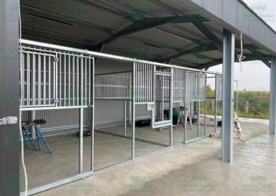 Hot galvanised dipped steel stable framework during installation