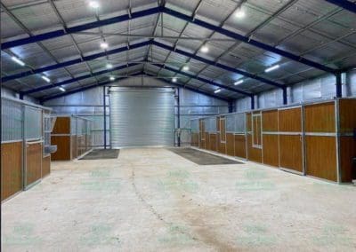 Stable complex with matching feed and tack room