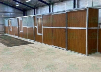 Matching tack room horse stables in timber