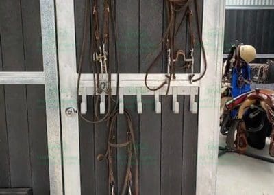 Bridle rack fitted to tack room door