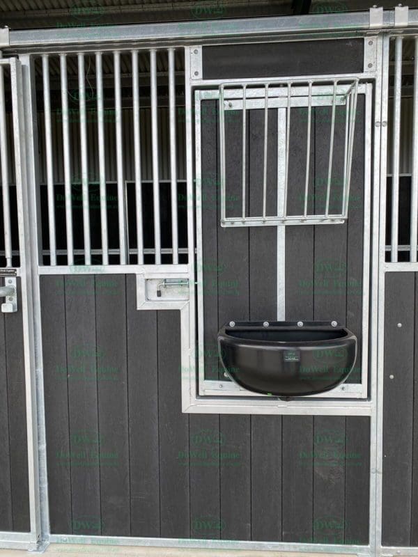 revolving hay & grain rack in horse stable